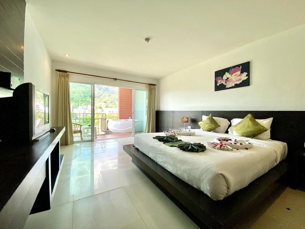 Vue intérieure d'une chambre Deluxe à APK Resort