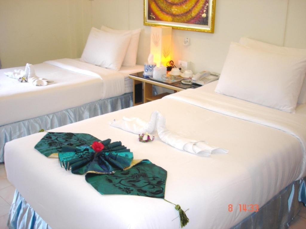 Chambre du Lamai Apartment