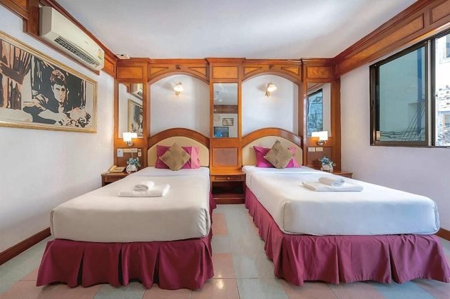 Lit d'une chambre Deluxe Twin au Lamai Hotel