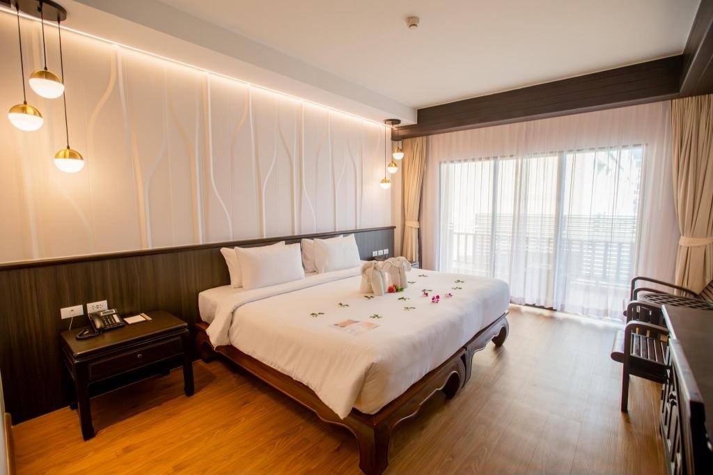 Lit d'une chambre Deluxe double ou twin au Nipa Resort