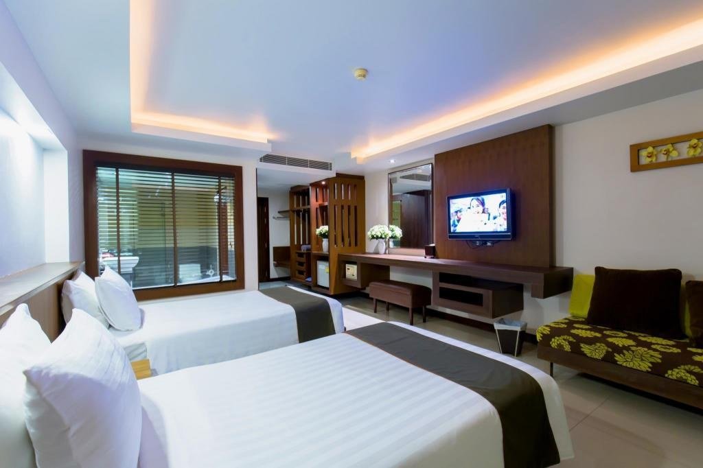 Chambre Deluxe avec lits jumeaux — Thanthip Beach Resort Patong