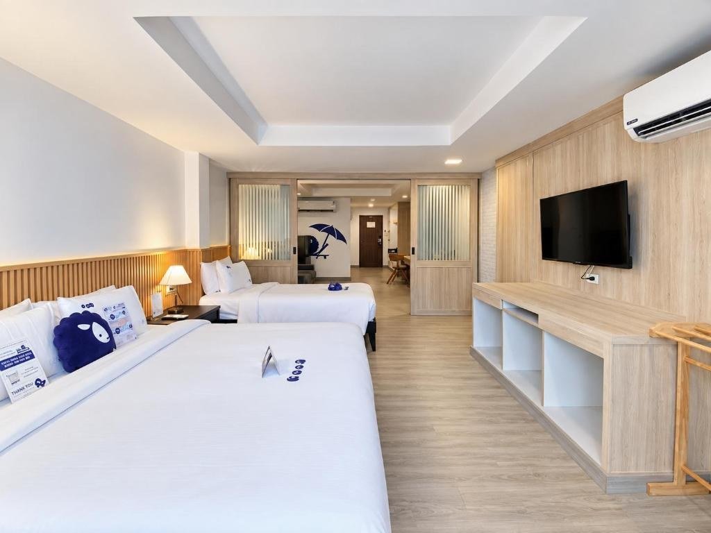 Chambre familiale Deluxe — Kokotel Phuket Patong